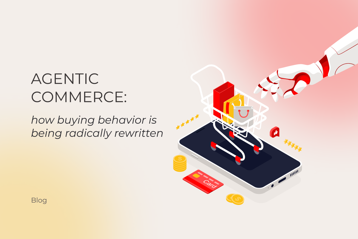 A robotic hand places a shopping bag into a digital shopping cart atop a smartphone. Nearby are gold coins, a credit card, and a gift box. The text reads: “Agentic Commerce: how buying behavior is being radically rewritten. Blog.”.