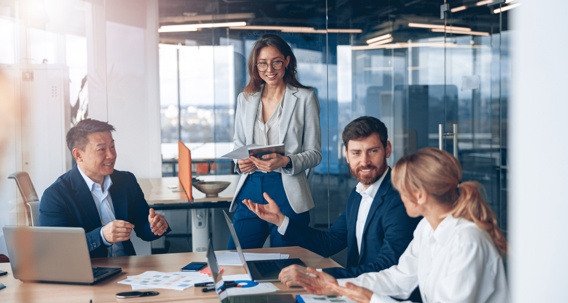Business team discussing enterprise software strategies in a professional corporate environment