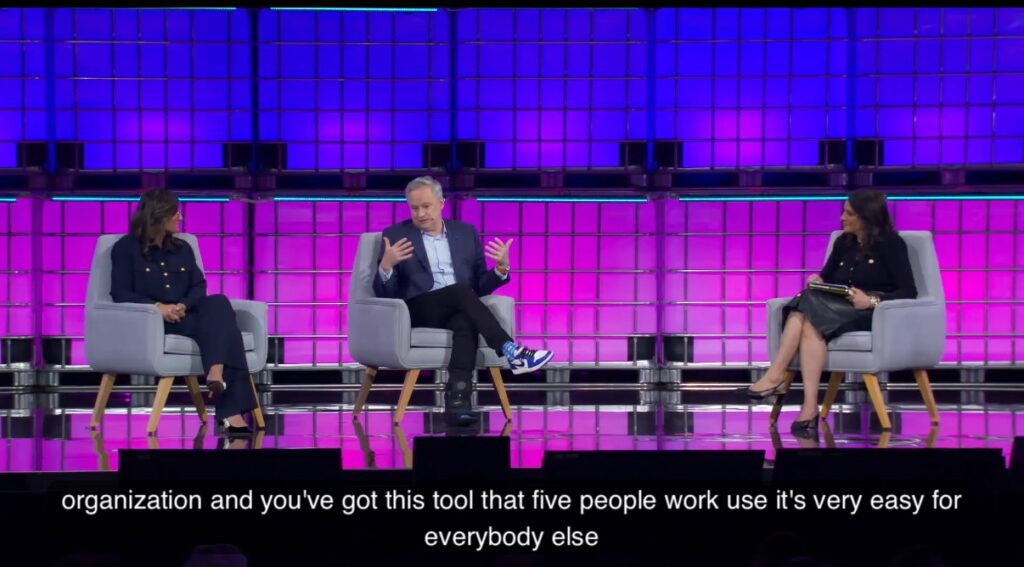 Carla Zakhem-Hassan and Jonathan Adashek in conversation on a WebSummit stage about AI-driven marketing transformation strategies, hosted by Maha Abouelenein