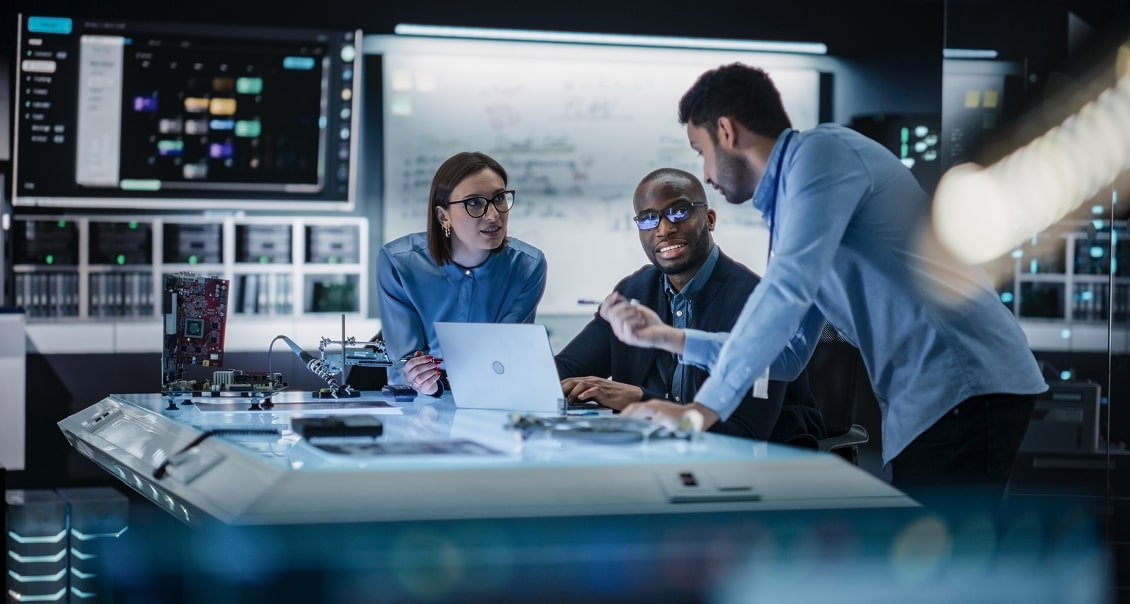 Tech team collaborating on an MVP project in a high-tech room
