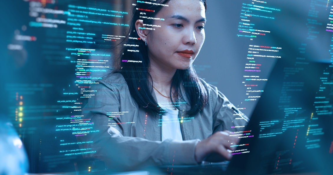 Female developer interacting with digital code and data overlay