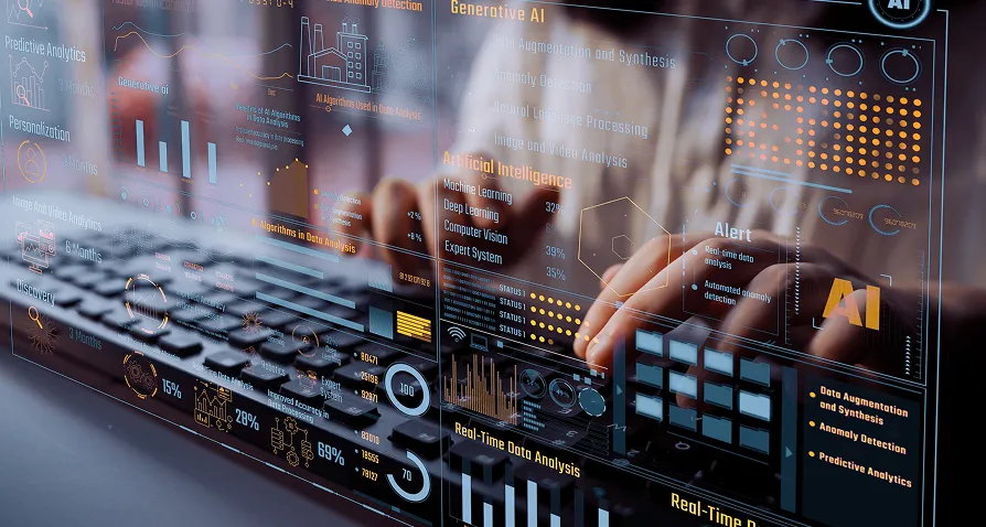 Hands type on a keyboard behind a transparent screen displaying futuristic data graphics, charts, and AI-related text, including bar graphs, circular diagrams, and digital interface icons in shades of orange, blue, and white.