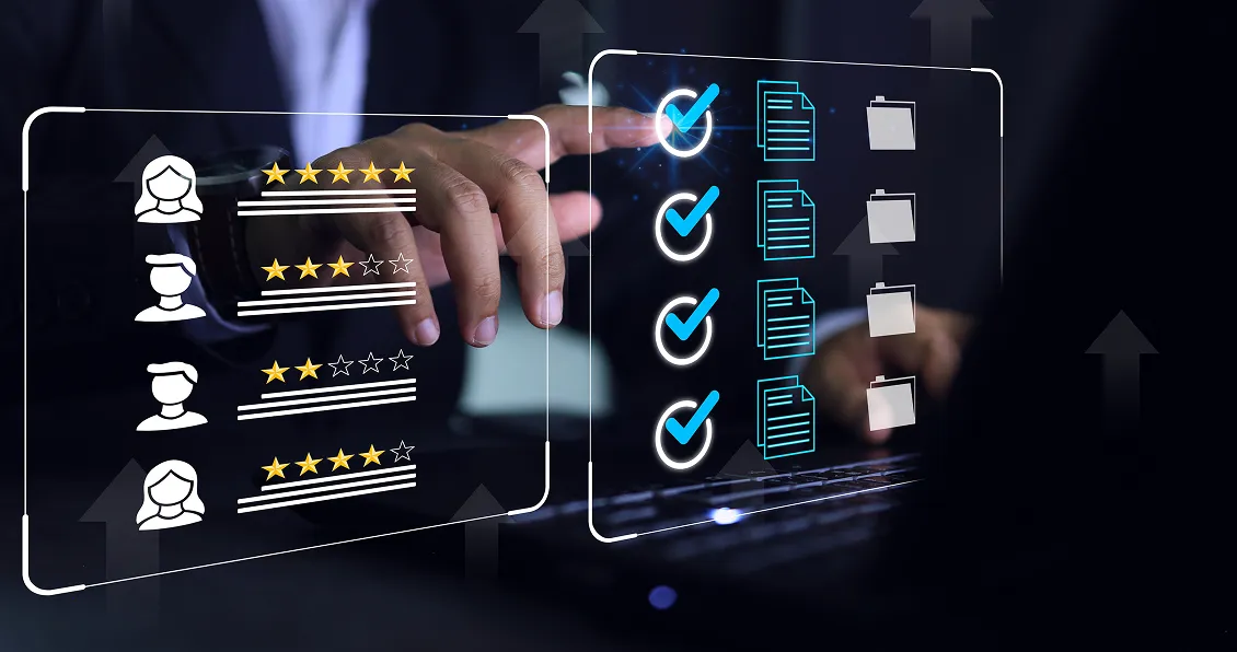 A person in a suit uses a laptop with transparent digital screens. One screen shows three user profiles with star ratings. The other displays checkmarks next to document and folder icons, symbolizing task or performance evaluation and completion.